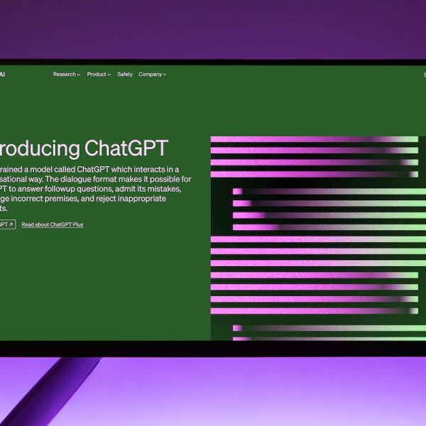 Monitor screen showing ChatGPT landing page
