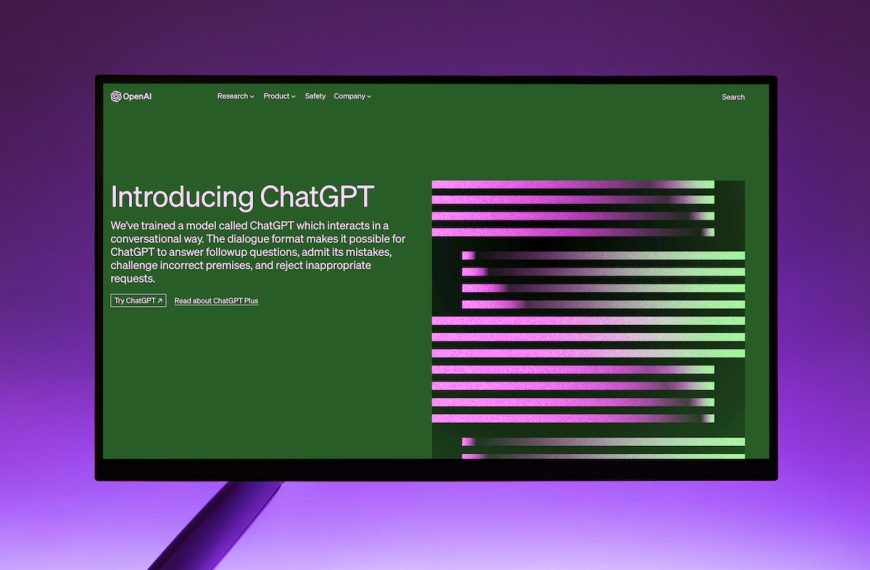Monitor screen showing ChatGPT landing page
